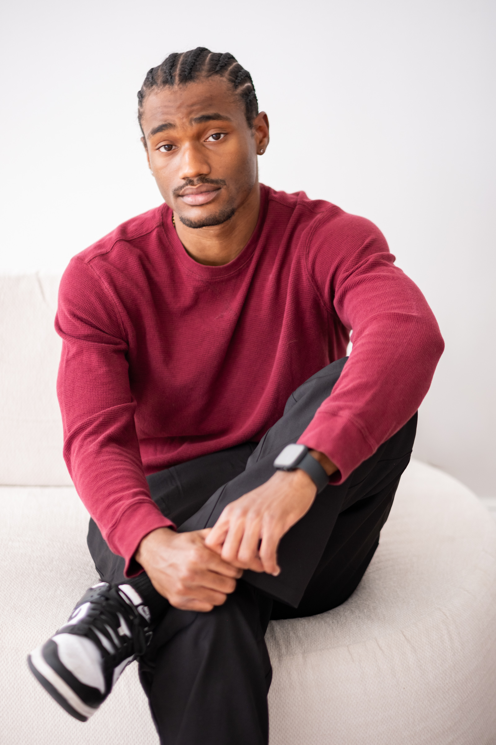 Richmond_Headshot_Portraits-38 Studio Modeling Acting Headshot of Man in Richmond Virginia wearing a red shirt and black pants
