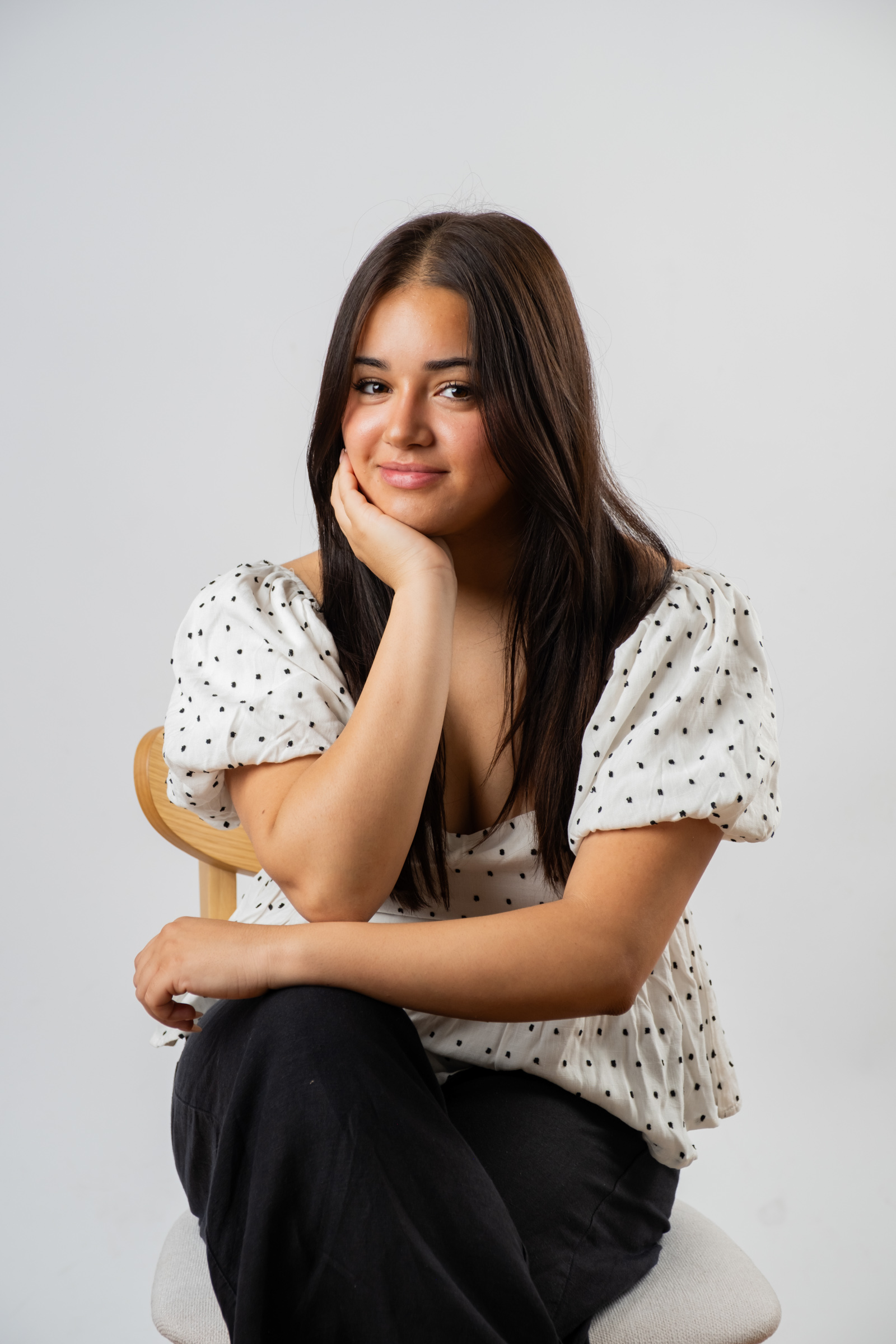 Richmond_Studio_Branding_Headshots-6 Studio Portrait of woman sitting on a chair in a professionally lit studio